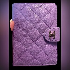 purple passport holder